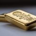 Gold Drops 0.2% to $2,415.61 Amid Strong Dollar