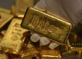 Gold jumps to record above $2,460 an ounce on hopes Fed will soon cut rates